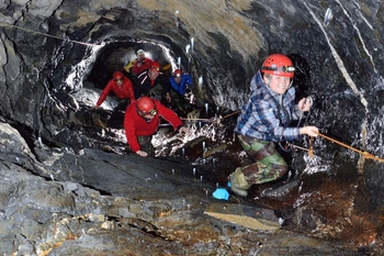 Family scaling shaft climb, scouts and school, adventure activity north wales